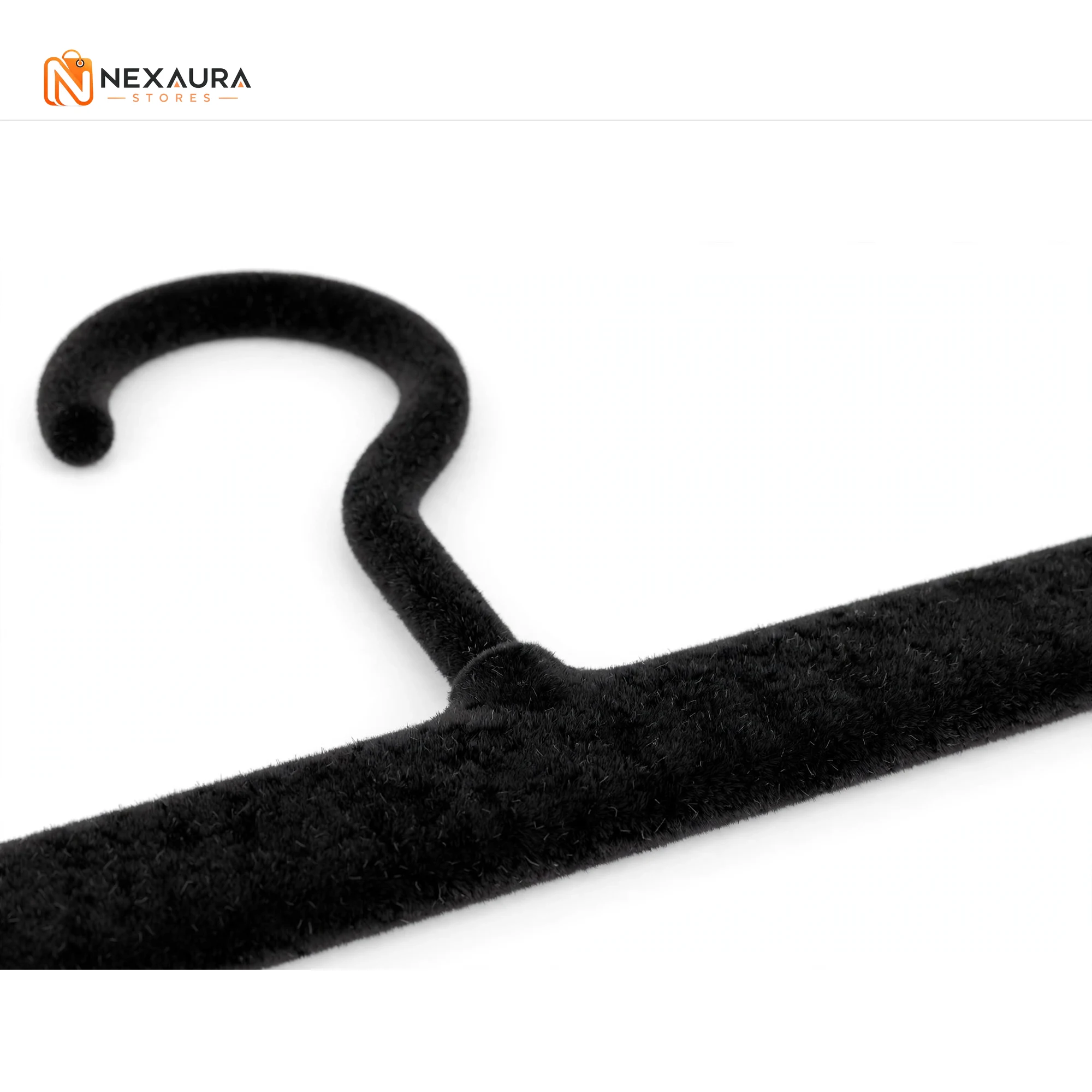 Close-up of velvet hanger with trouser bar